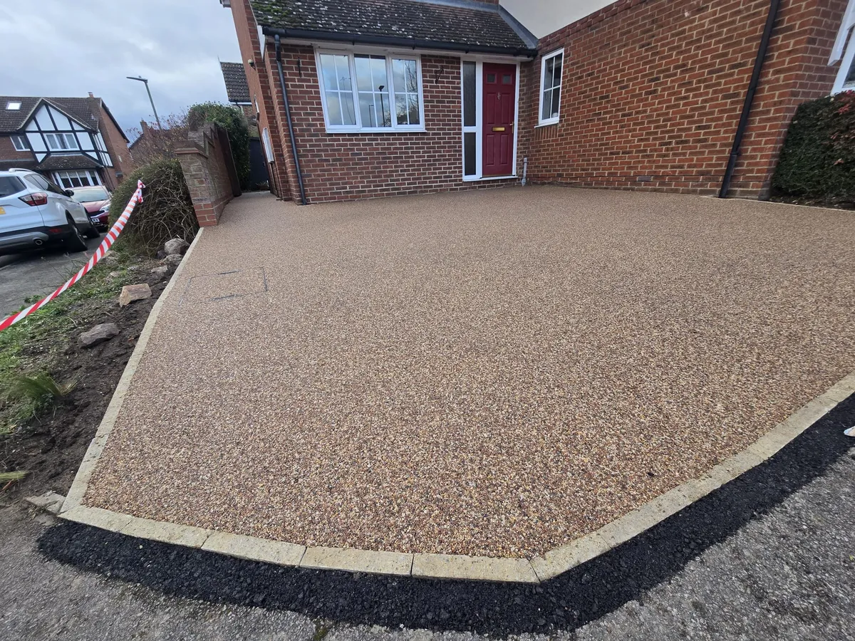 New golden resin driveway laid by Prime Paving and Resin
